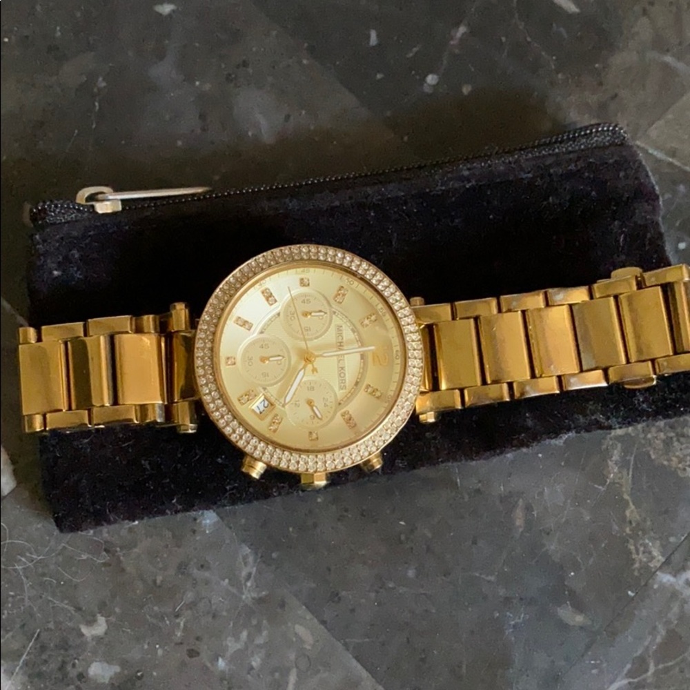 Gold Michael Kors watch.